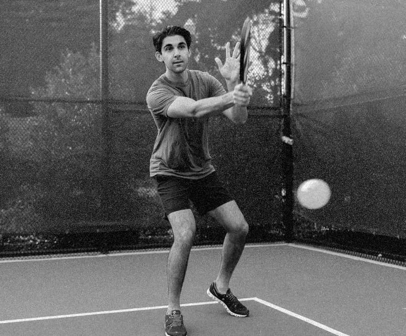 Sage & Paddle court player